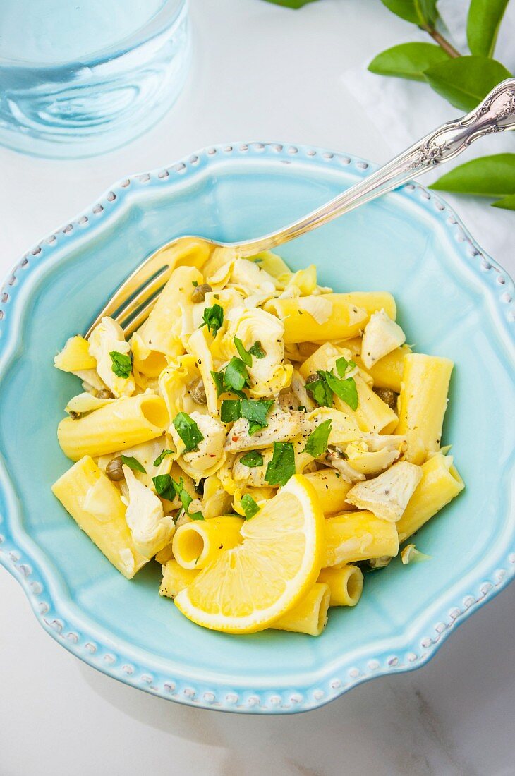 Gluten-free pasta with a lemon and artichoke sauce (seen from above)