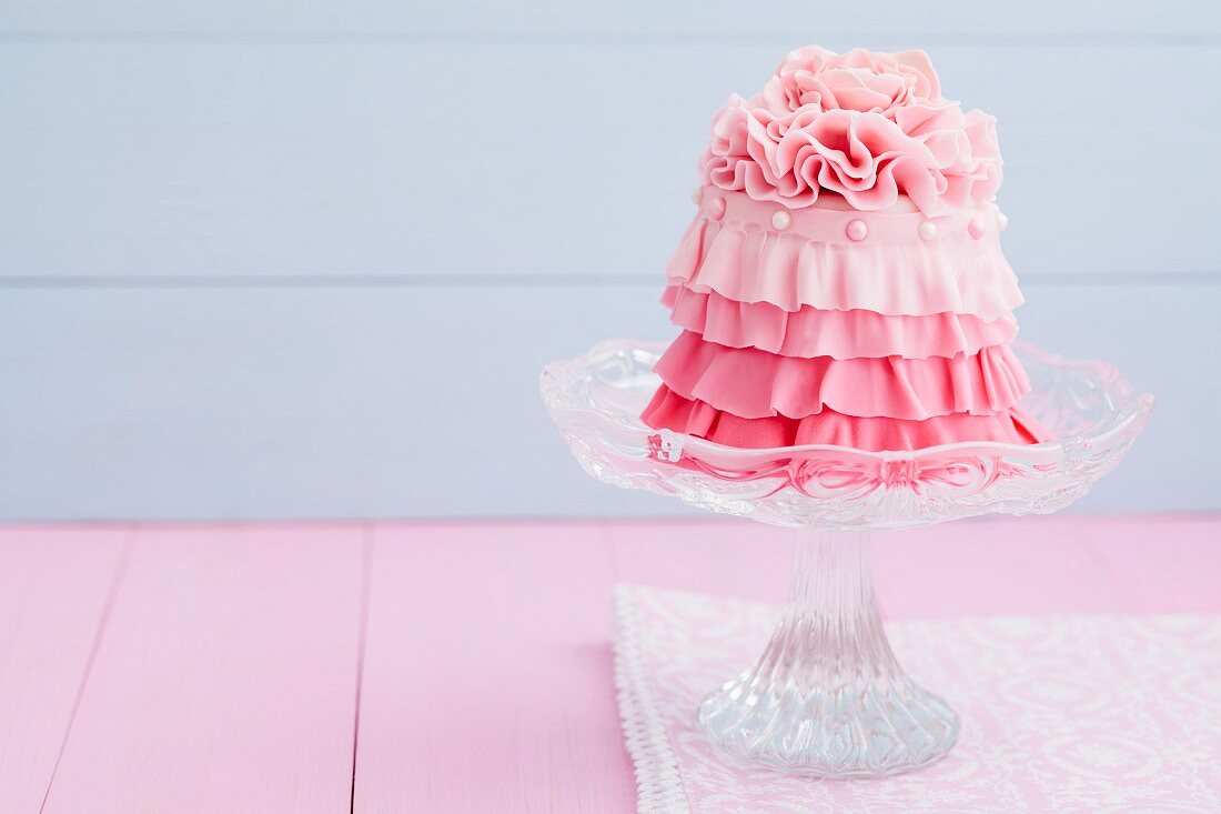 Minikuchen mit rosa Icing-Dekor
