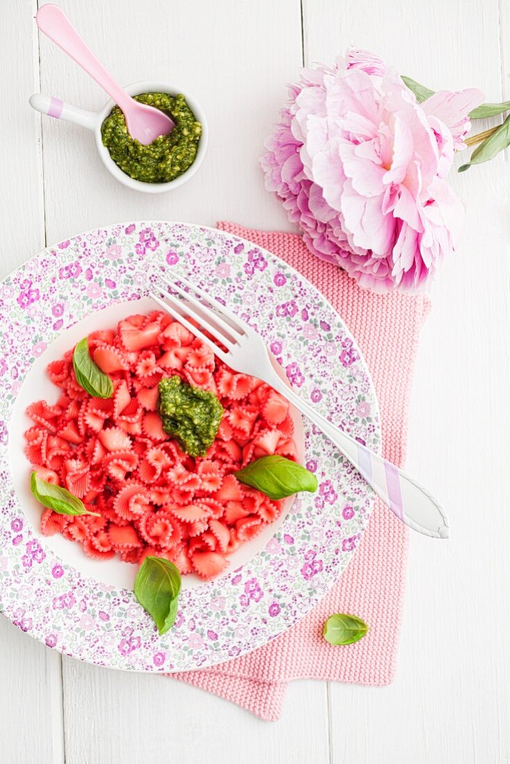 Pink pasta with basil and pesto