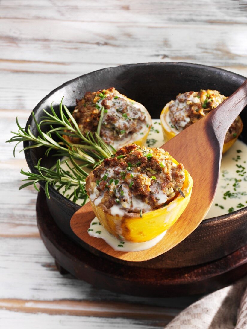 Turnips with a minced meat filling in a creamy sauce