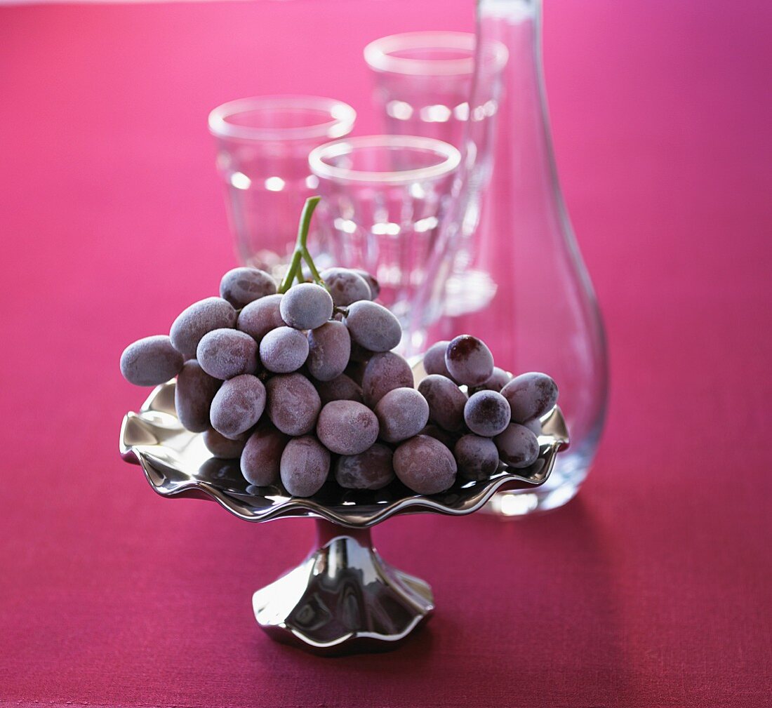 Iced grapes in a silver dish