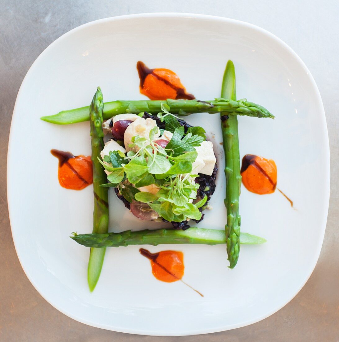 Vegetable tartar with feta cheese and green asparagus