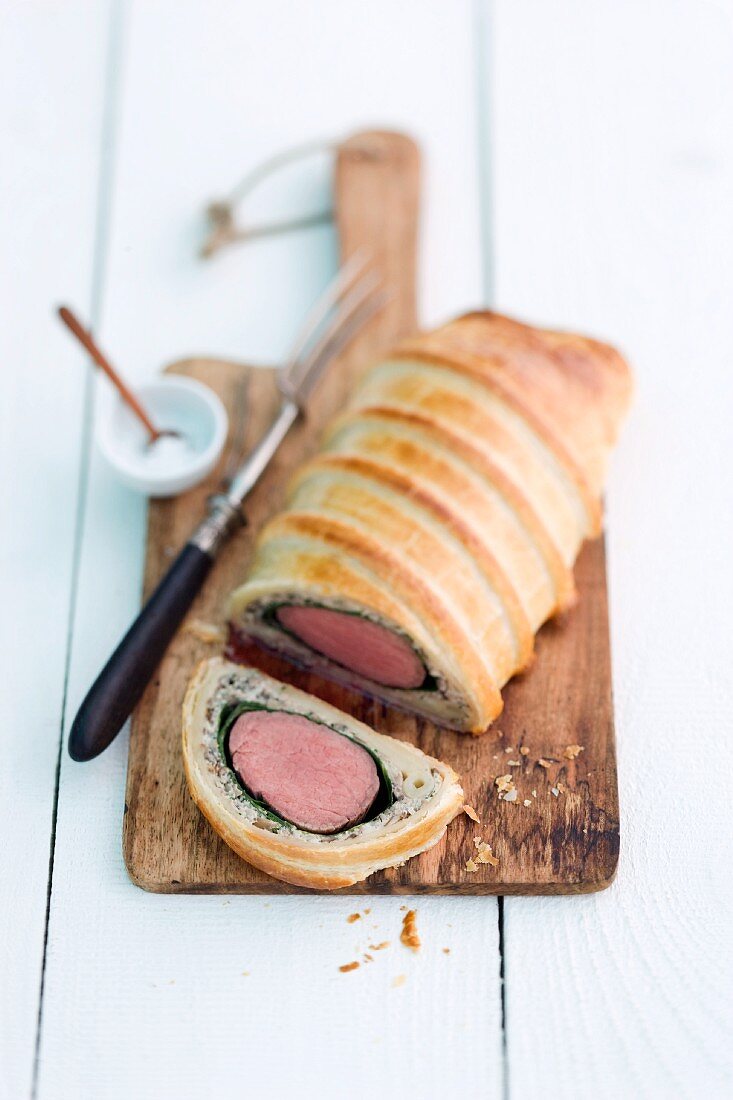 Beef Wellington on a wooden board