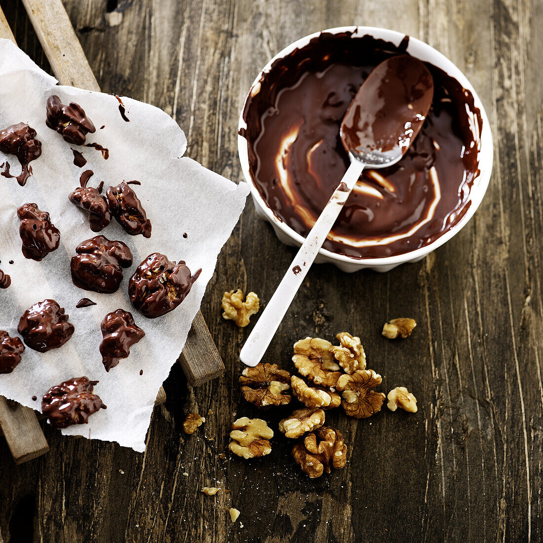 Walnuts with melted chocolate
