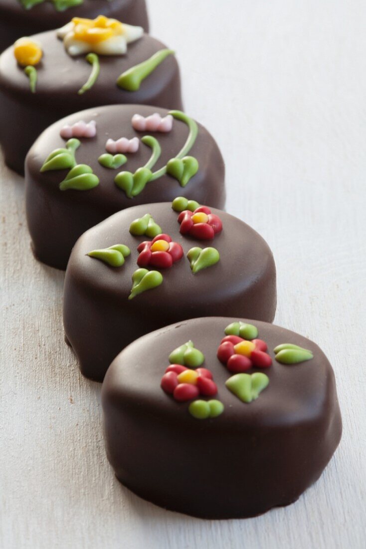 Chocolate pralines with sugar decorations