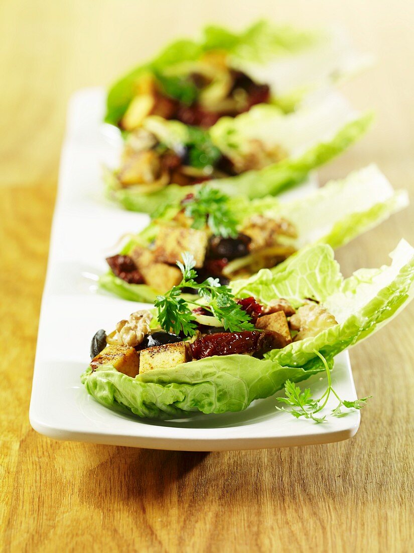 Cos lettuce leaves with tofu, olives and chervil