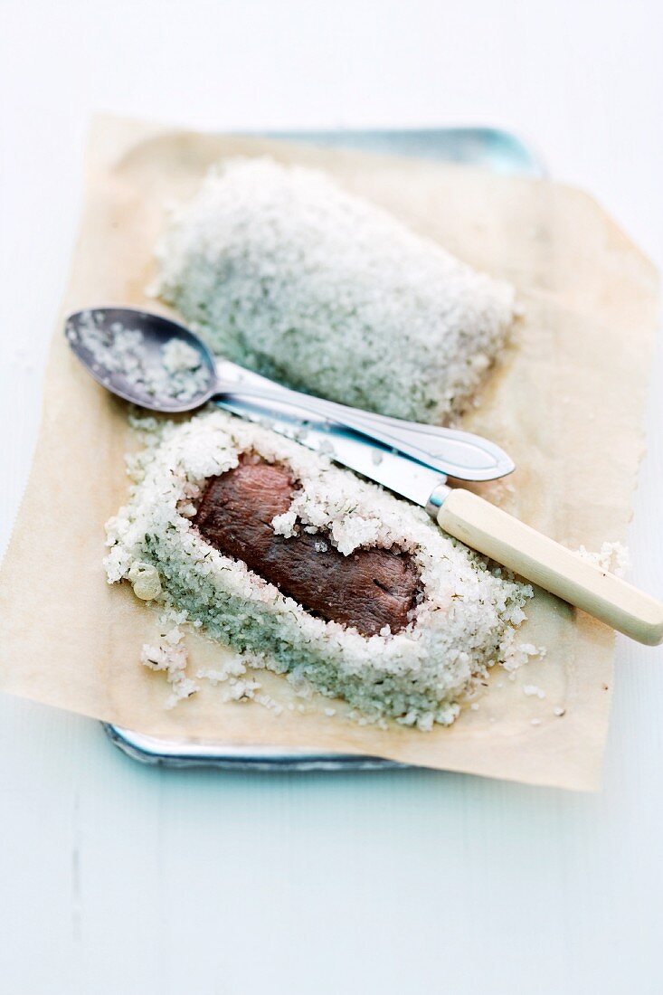 Saddle of lamb coated in salt