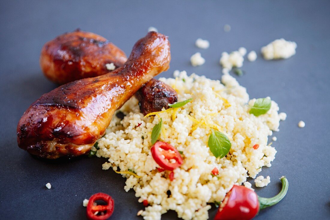 Glazed chicken legs with couscous
