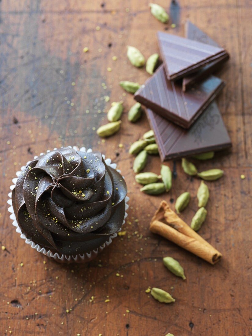 A chocolate cupcake with cardamom and cinnamon