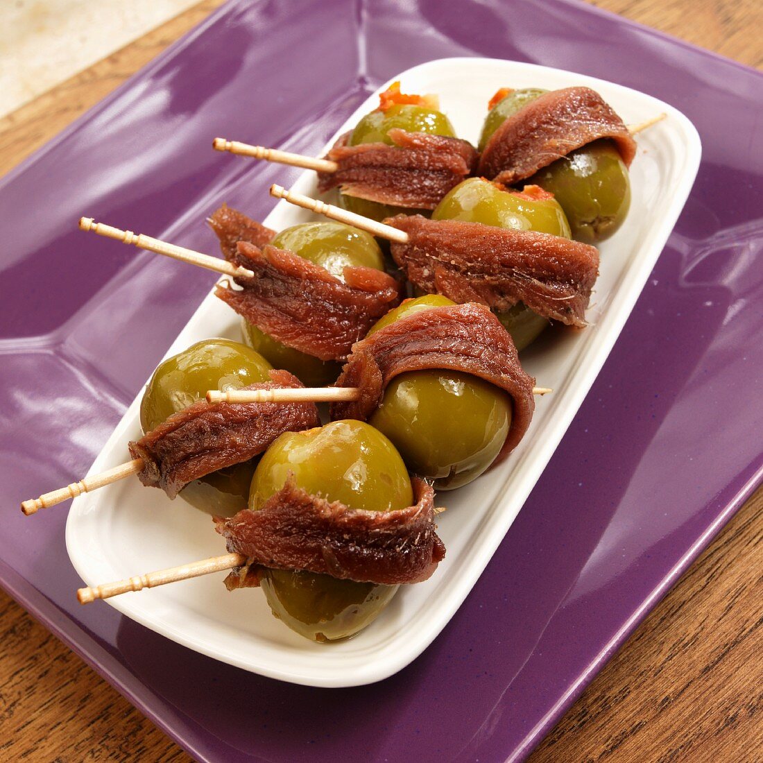 Green olives wrapped in anchovies (Spanish tapas)