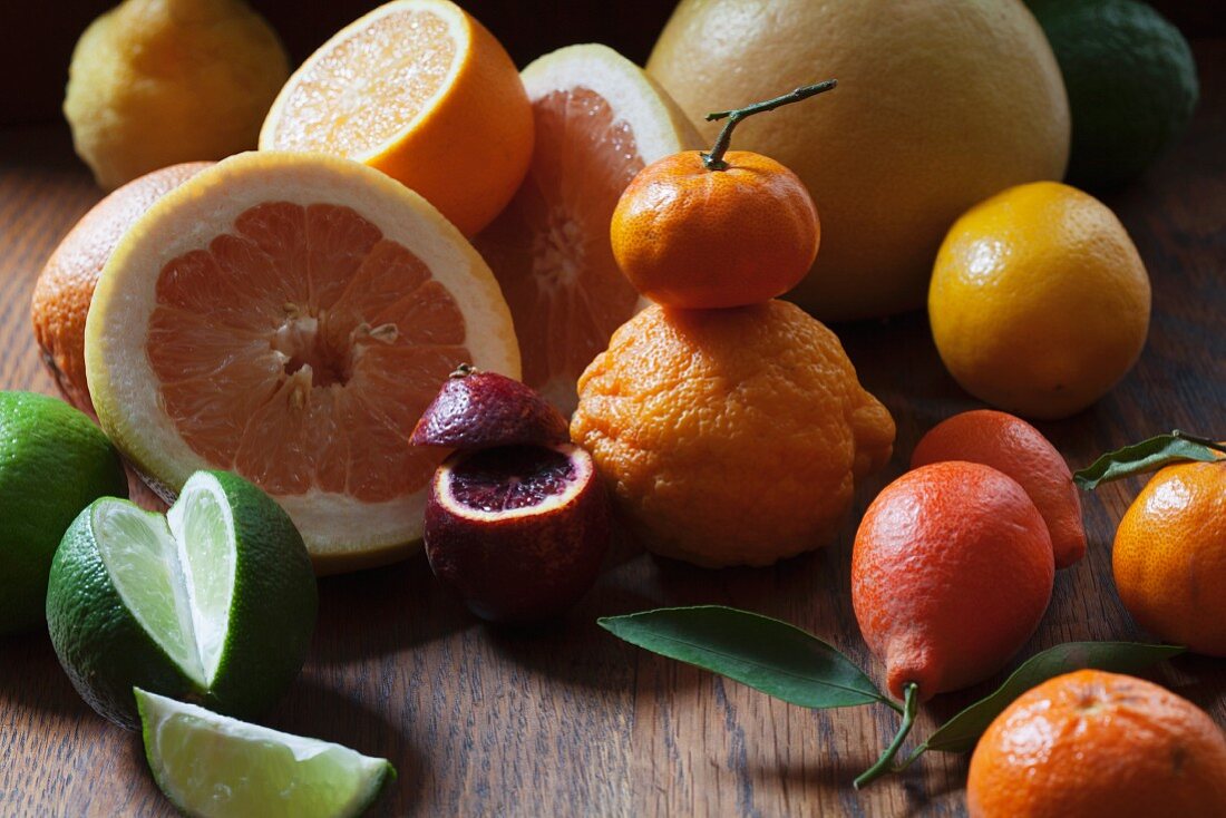 An arrangement of citrus fruits featuring kumquats, blood oranges, mandarins, lemons, oranges and grapefruits