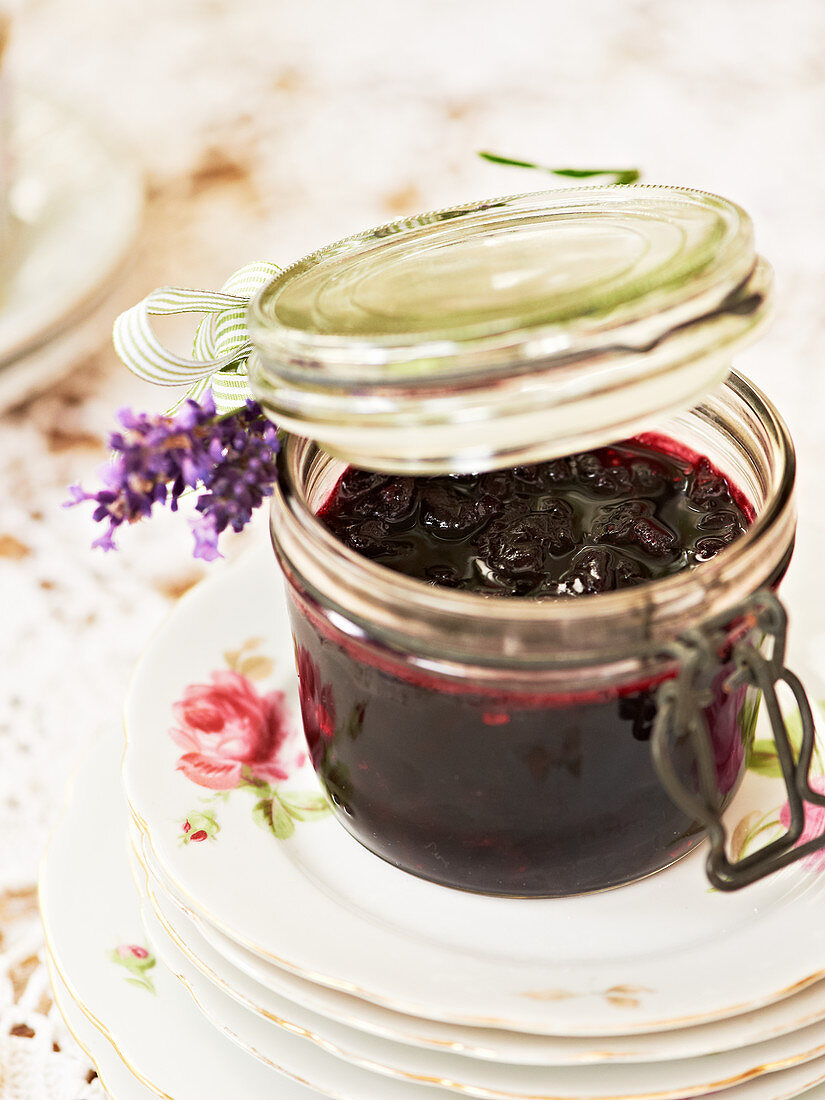 Cherry and lavender chutney in a preserving jar