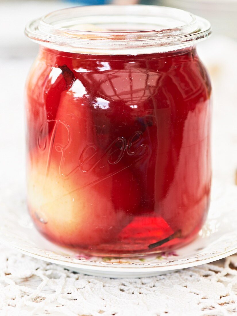 A jar of red wine pears