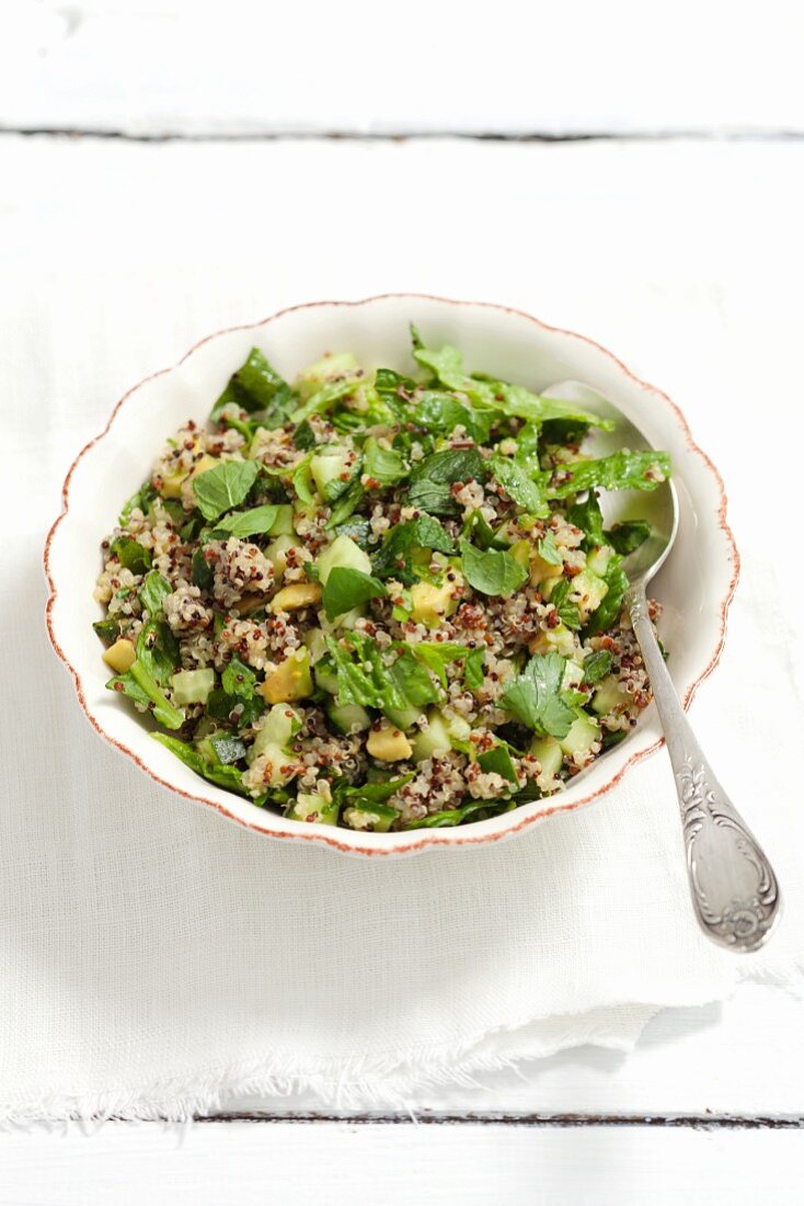 Quinoa salad with cucumber, cos lettuce and herbs