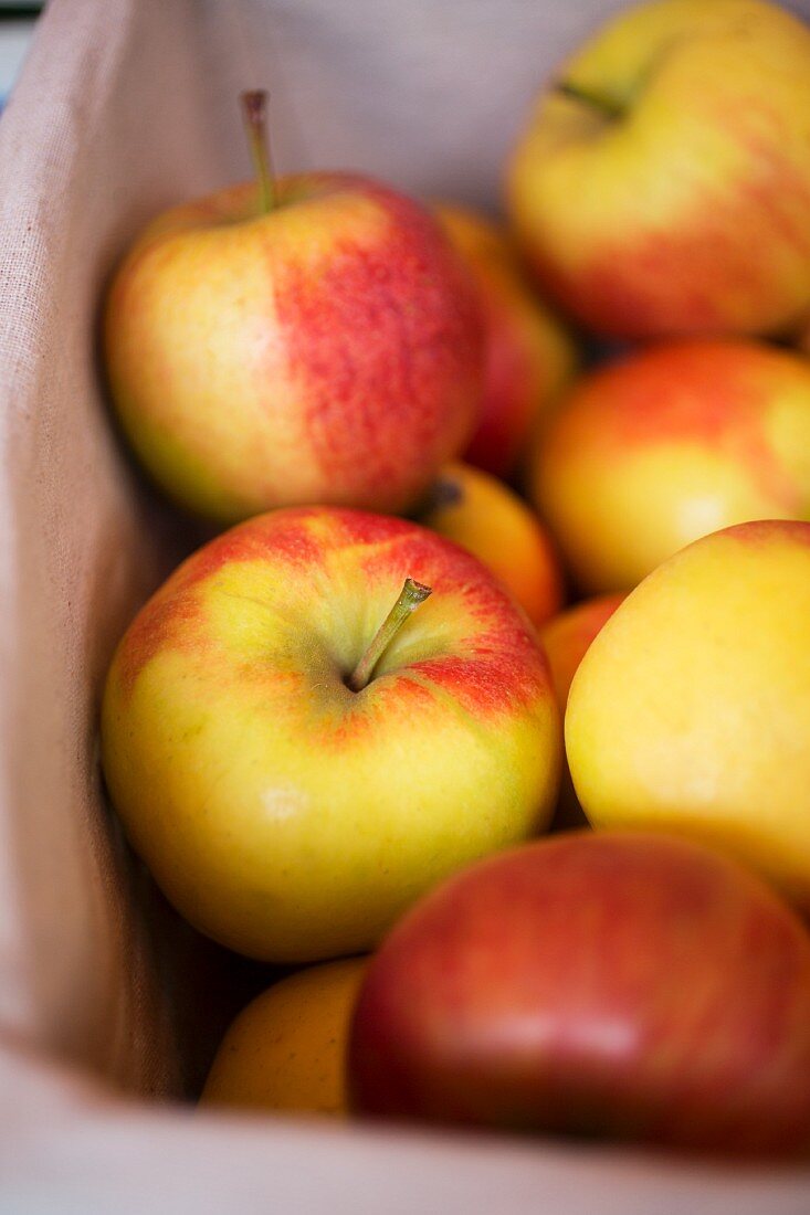 A crate of fresh apples
