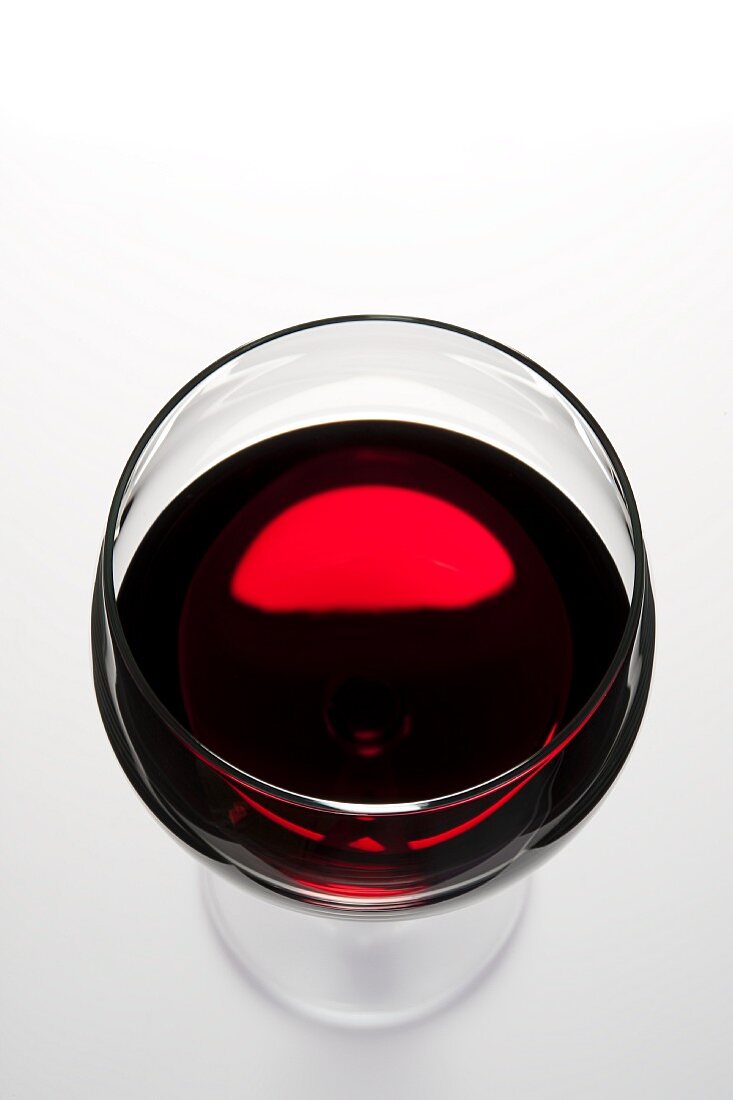 A glass of red wine seen from above