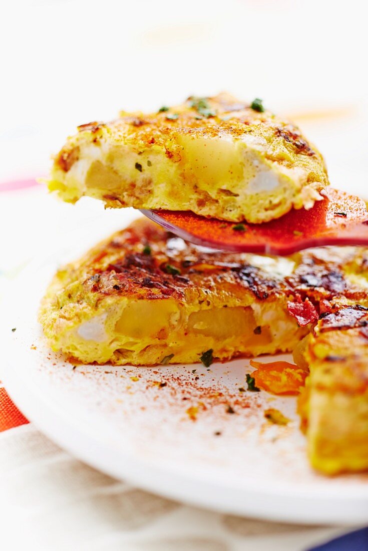 A potato tortilla, sliced