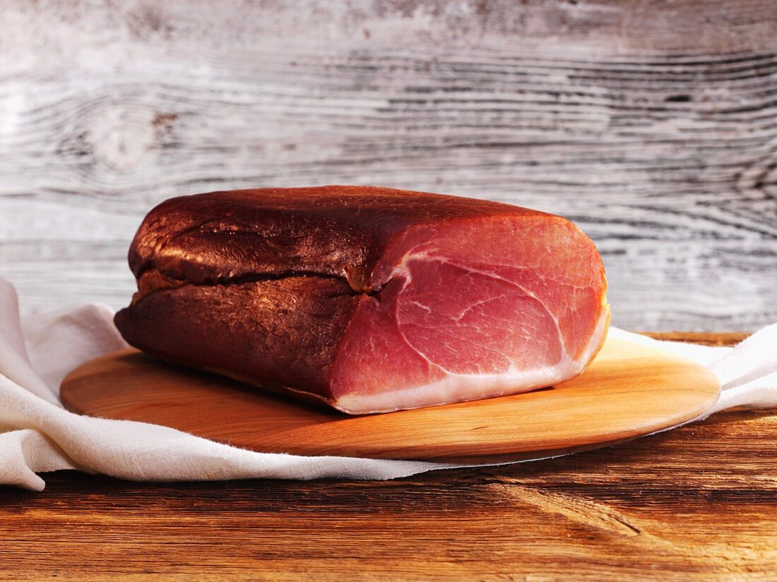 Black Forest ham on a wooden board