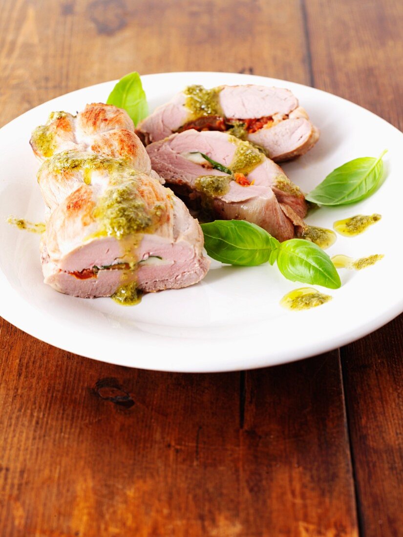 Stuffed pork fillet with basil, tomatoes, mozzarella and pesto