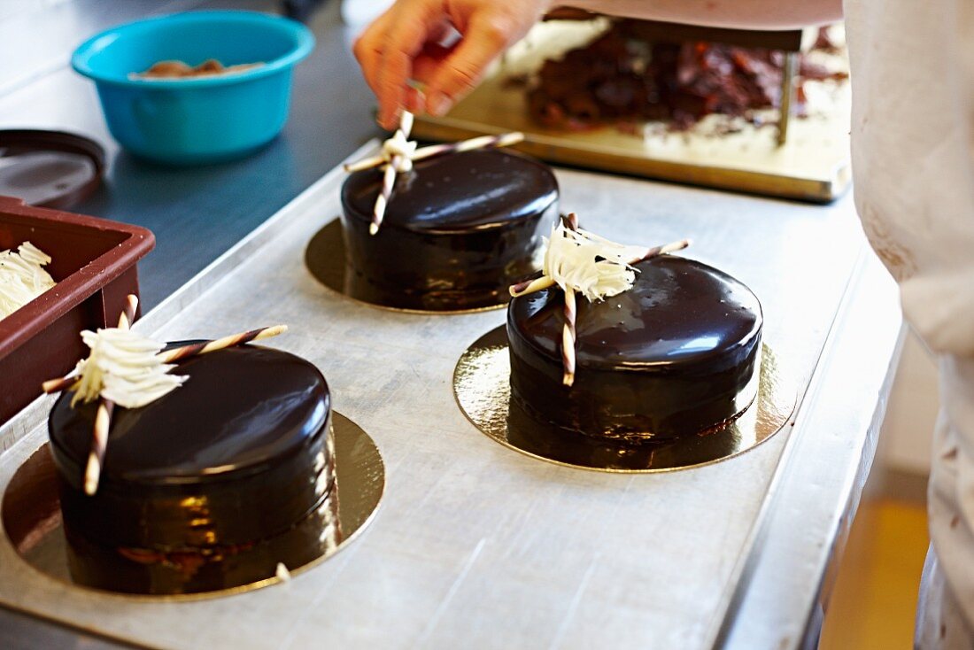 Festive cakes with a dark chocolate glaze