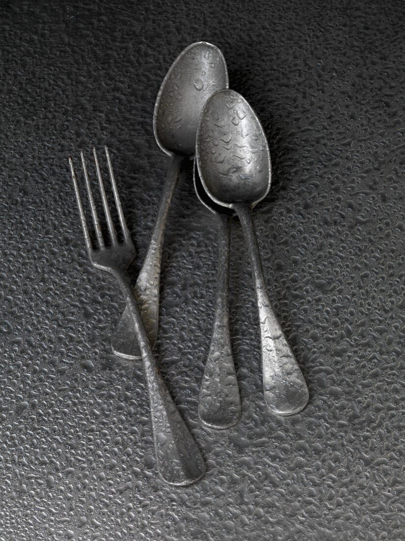 Old spoons and a fork