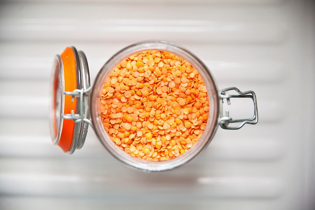 Red lentils in a flip-top jar