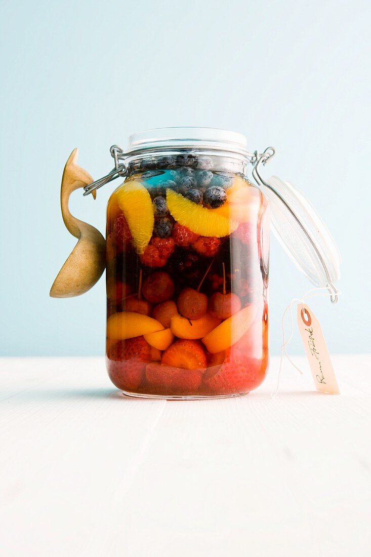 A jar of rum fruits