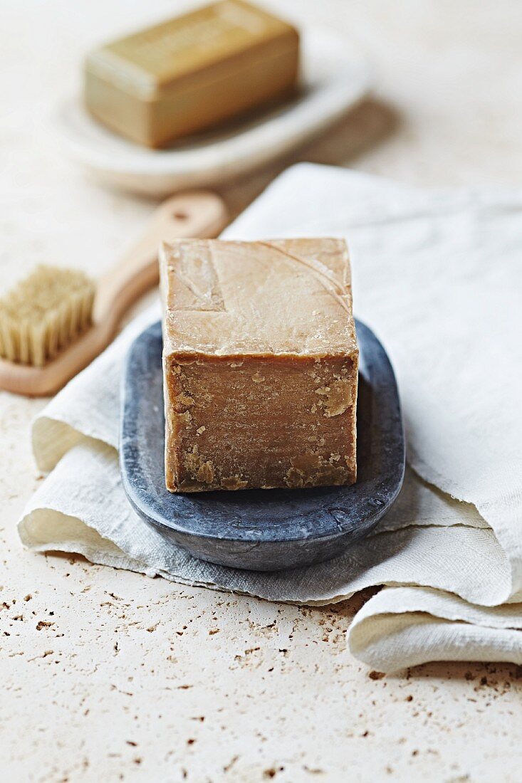 Olive soap in a stone dish