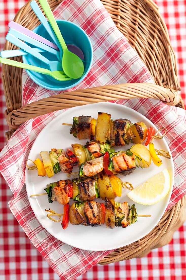 Grilled salmon and vegetable skewers for a picnic