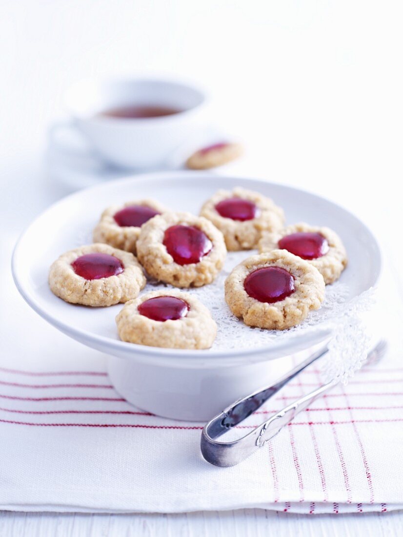 Husarenbusserl (shortbread jam biscuits) on a cake stand