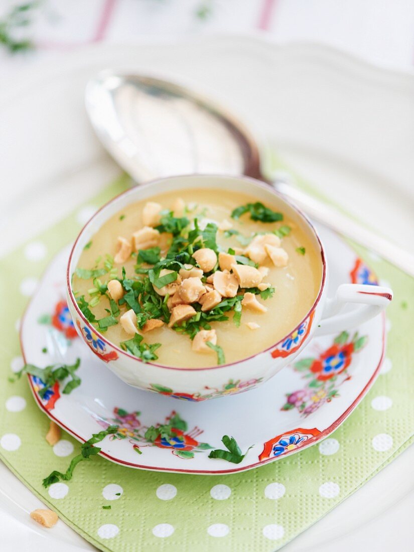 Potato and coriander soup with peanuts