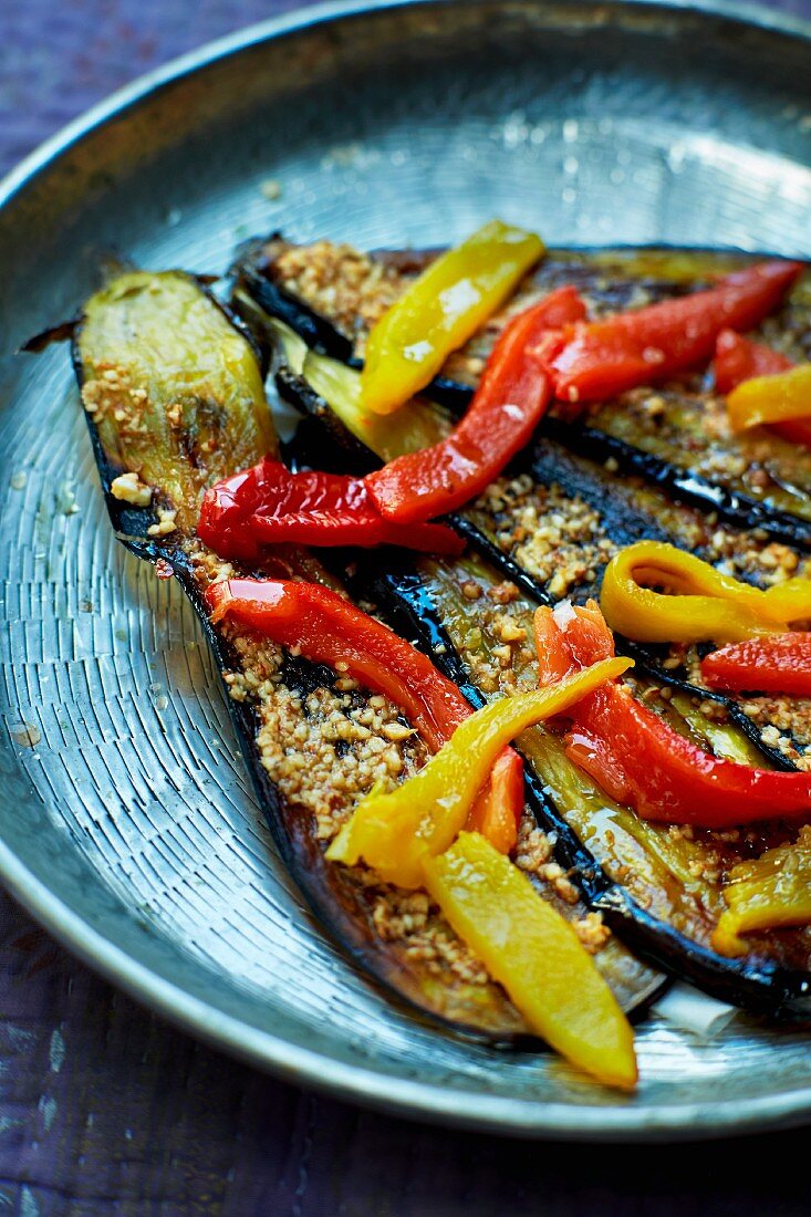 Grilled aubergine with peppers and almonds