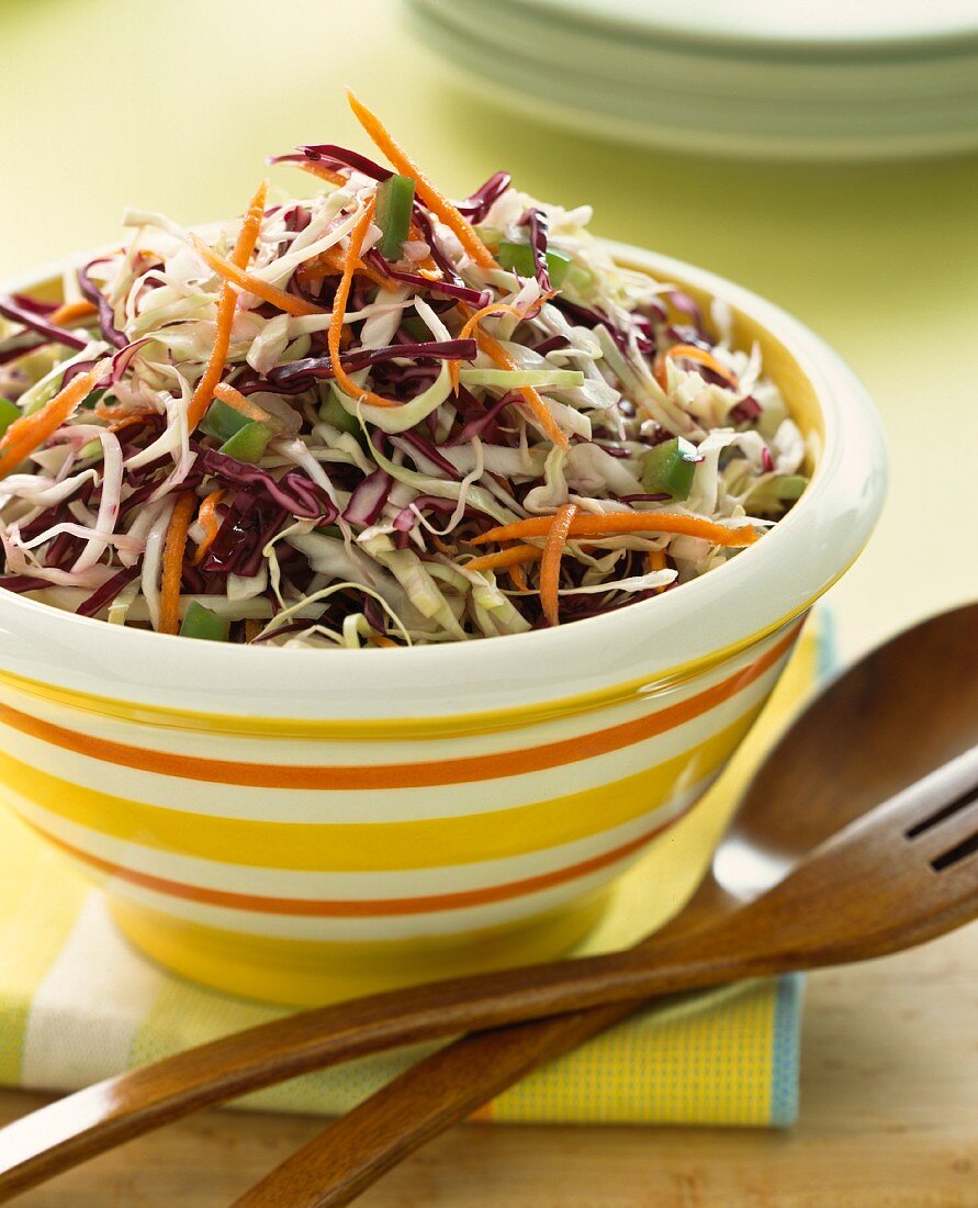 Coleslaw in a striped bowl