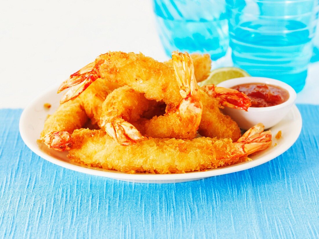 Battered king prawns with a dip