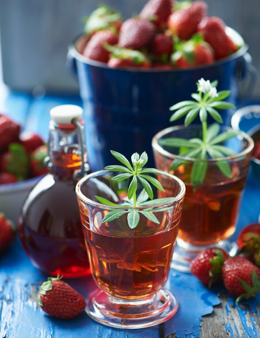 Glasses of strawberry syrup