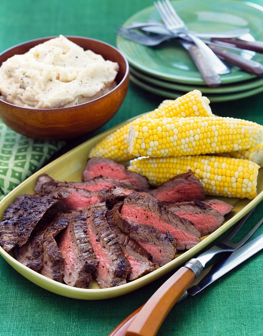 Beef steak with mashed potatoes and sweetcorn