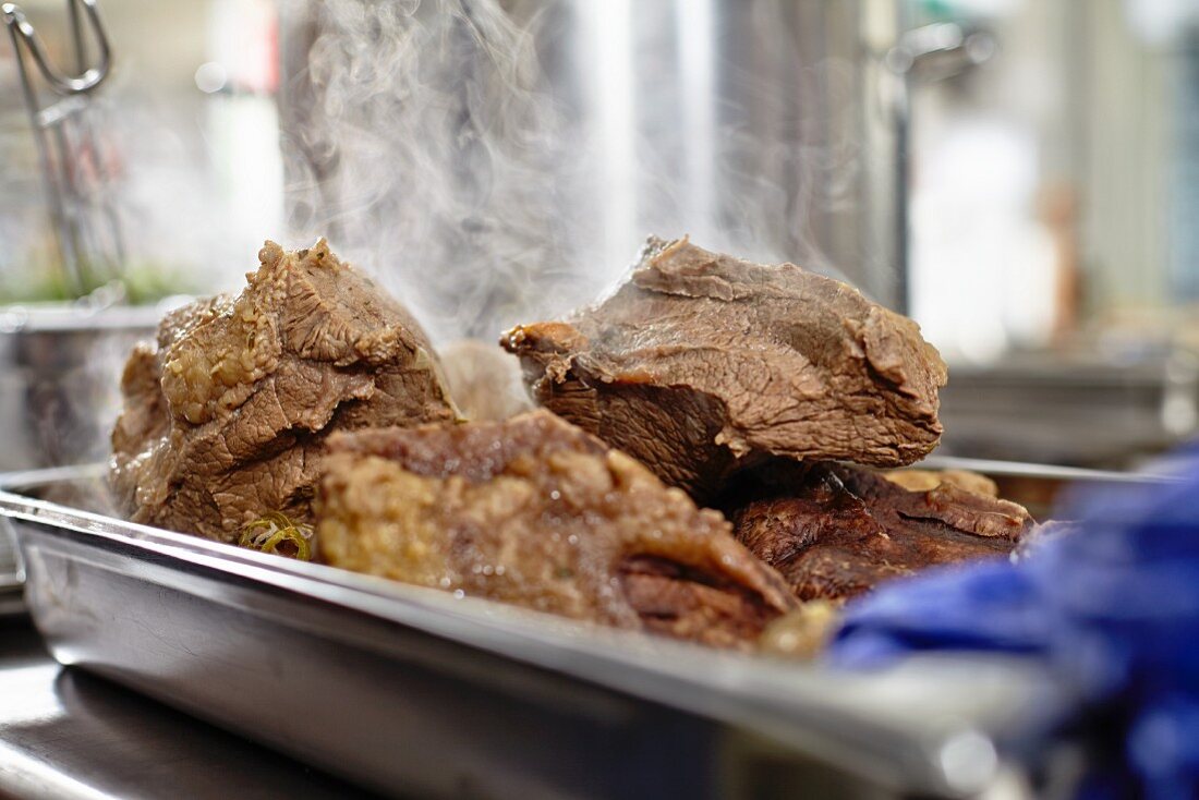 Boiled beef in food warmer