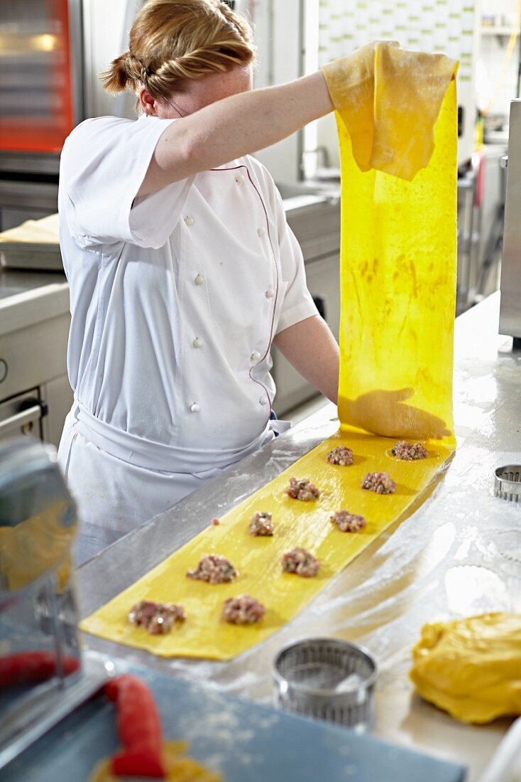 A chef making ravioli
