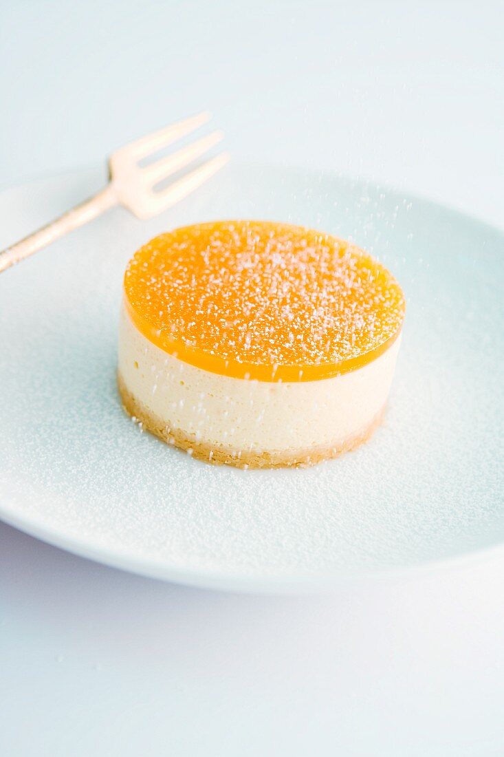 Passion fruit tartlet with icing sugar