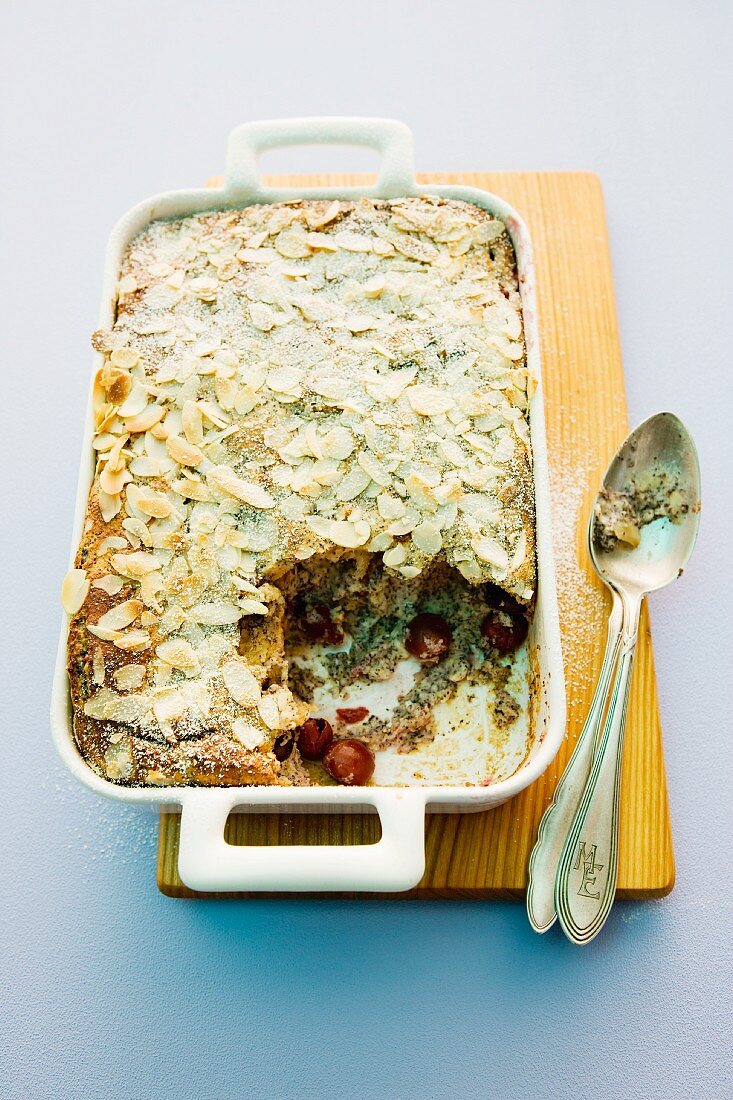 Mohnmichel (poppy seed bread pudding) with cherries and slivered almonds