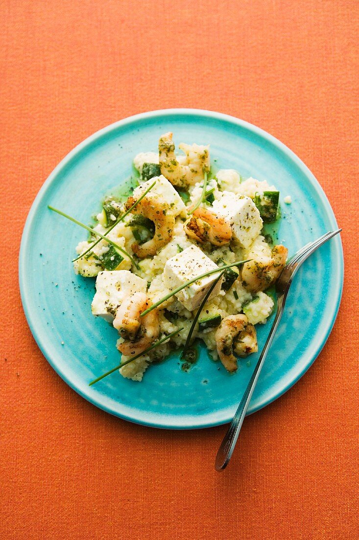 Couscous prawn salad with courgettes and feta cheese