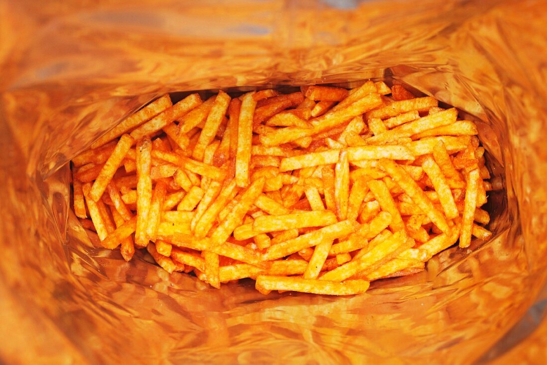 A bag of potato crisp sticks (seen from above)