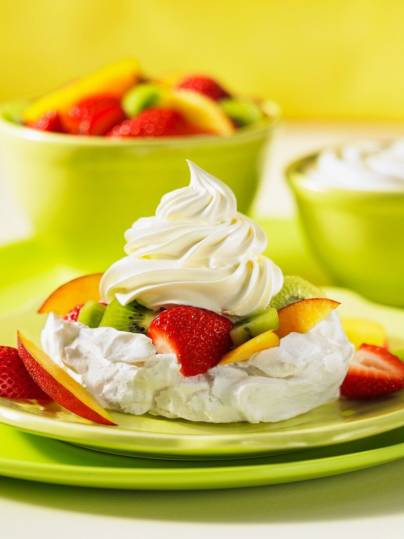 Pavlova with kiwis and strawberries