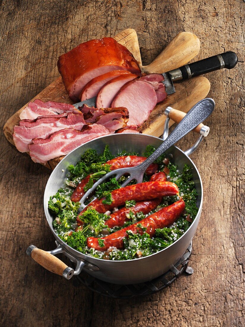 Green kale with smoked pork chops, Pinkelwurst (smoked sausage from bacon, groats and spices) and bacon