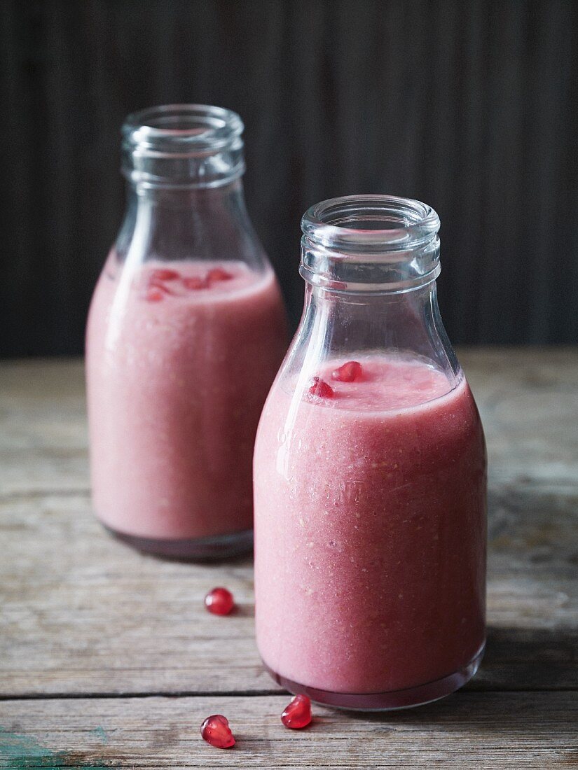 Pink smoothies with pomegranate seeds