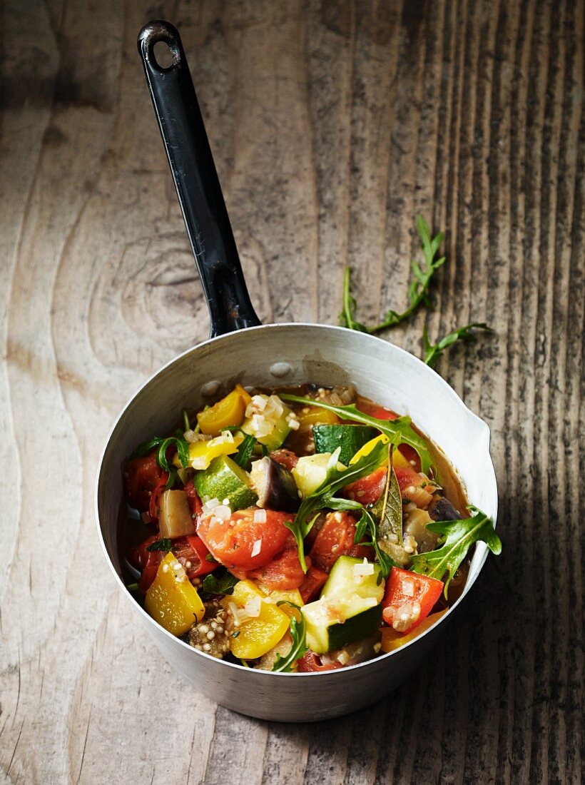 Ratatouille with rocket in a saucepan