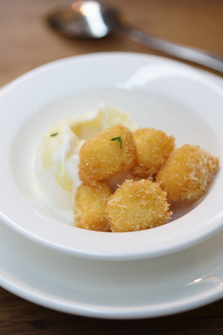 Deep-fried cheese balls with vanilla ice cream