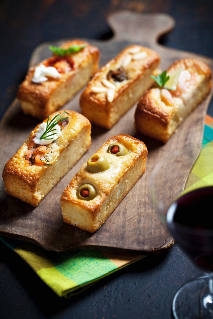 Spicy cakes with olives and smoked salmon