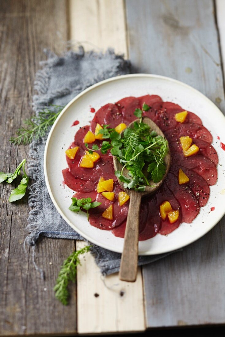 Wildcarpaccio mit Beeren-Orangen-Mus