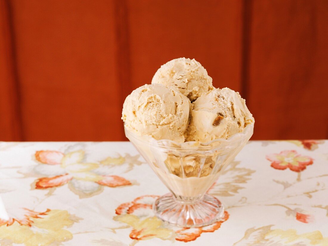 Caramel ice cream in a sundae glass